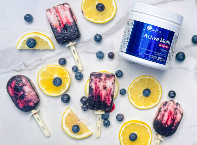 Active Multi Blueberry Lemon popsicles surrounded by blueberries and lemons