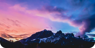 Regulates your emotions A woman walks on an empty beach at sunset with her back towards the camera.